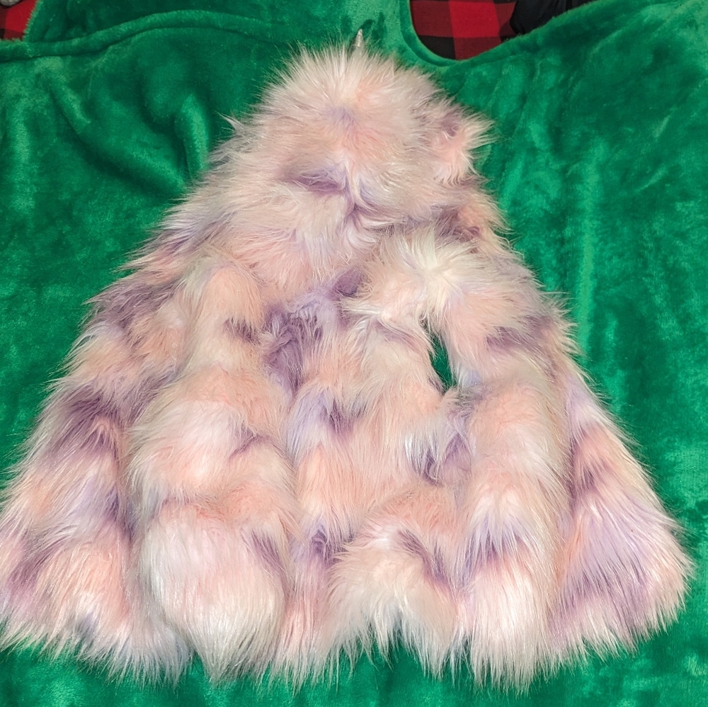 Gently used Faux fur unicorn vest
